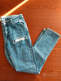 Jeans uomo con strappi