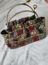 Pochette/borsa a mano da sera con paillettes