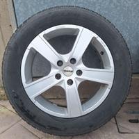 Cerchi in lega MOMO con gomme da neve  Hankook