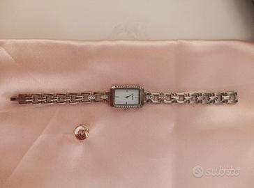  Orologio ed  orecchini 