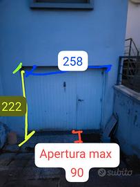 Porta+basculante+garage+con+porta+ingresso+