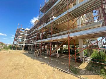 Villa a schiera con solarium di copertura