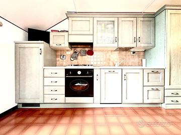 Cucina Scavolini in legno con tavolo e sedie