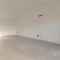 Attico di nuova costruzione con posto auto