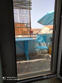 Cabras PenisolaSinis Openspace con balcone Agosto