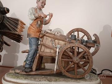 statua arrotino ceramica 