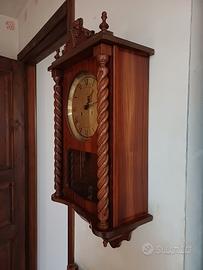 orologio da parete a pendolo
