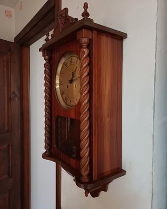 orologio da parete a pendolo