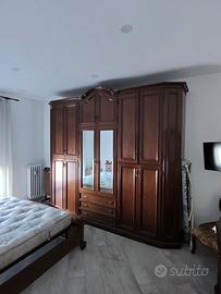 Camera da letto noce massello