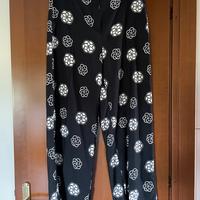 Pantaloni eleganti a fiori bianchi