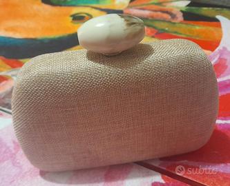 Una splendida pochette per una donna raffinata 👛