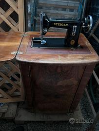 Vecchia macchina da cucire Steigen