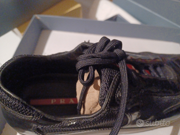 Ballerina con lacci e elastico Prada