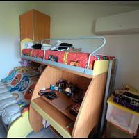 Camera a soppalco tre letti 