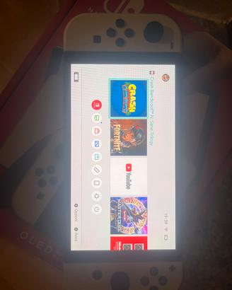 NINTENDO SWITCH OLED + CRASH NSANE TRILOGY