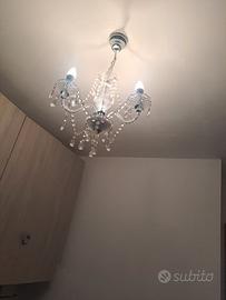 lampadario  grigio   e trasparente  