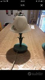 Triss di lumi in ferro battuto