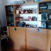 Letto singolo a scomparsa con libreria