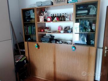 Letto singolo a scomparsa con libreria