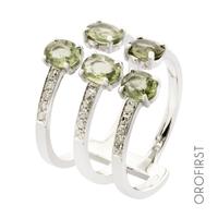 Anello oro bianco con diamanti e zaffiri verdi