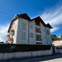 Bilocale arredato con giardino privato e box