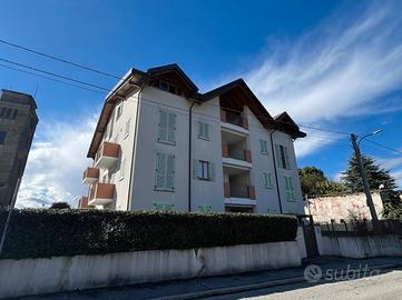 Bilocale arredato con giardino privato e box