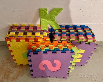 Tappeto puzzle bambino/a