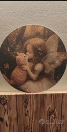 Decorazione in metallo tonda Baby Fatina con
dolce