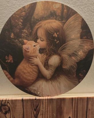 Decorazione in metallo tonda Baby Fatina con
dolce