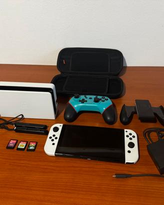 Nintendo Switch OLED + 3 giochi e controller