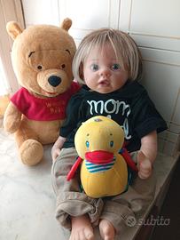 Reborn doll  con peluches