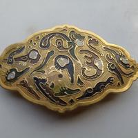 Fermacapelli decorato in metallo dorato