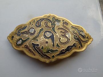 Fermacapelli decorato in metallo dorato