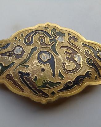 Fermacapelli decorato in metallo dorato
