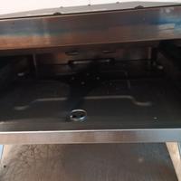 Forno a gas per pizza tonda con pietra girevole.