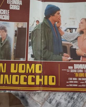 locandina film ( foto buste) un uomo in ginocchio