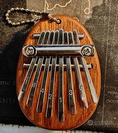 Piccolo strumento musicale portatile