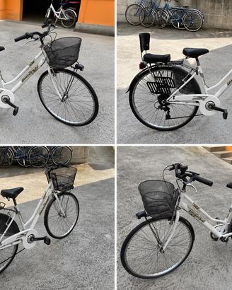 Bici passeggio donna con seggiolino per bambino