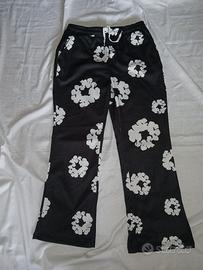 pantaloni denim tears