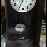 Antico orologio pendolo