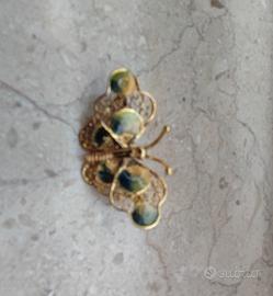 spilla in argento dorato