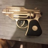 Accendini a forma di pistola 
