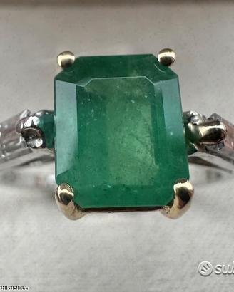 Anello in platino oro diamanti e smeraldo brasile