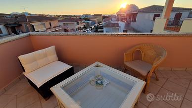 Attico panoramico con terrazze vista Tavolara