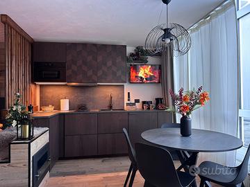 Super Mono a Marilleva 1400 sopra pista da Scii