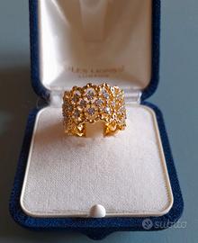 Anello eternity a fascia traforata oro zirconi