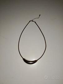 Collana rigida con maglia metallica