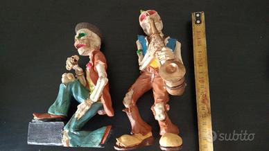 coppia di figure scheletri musicisti in plastica
