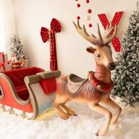 Renna e slitta in resina