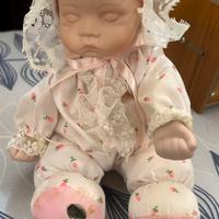 Bambola neonato con carillon